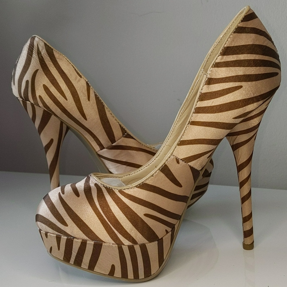 Tan zebra platform satin pumps